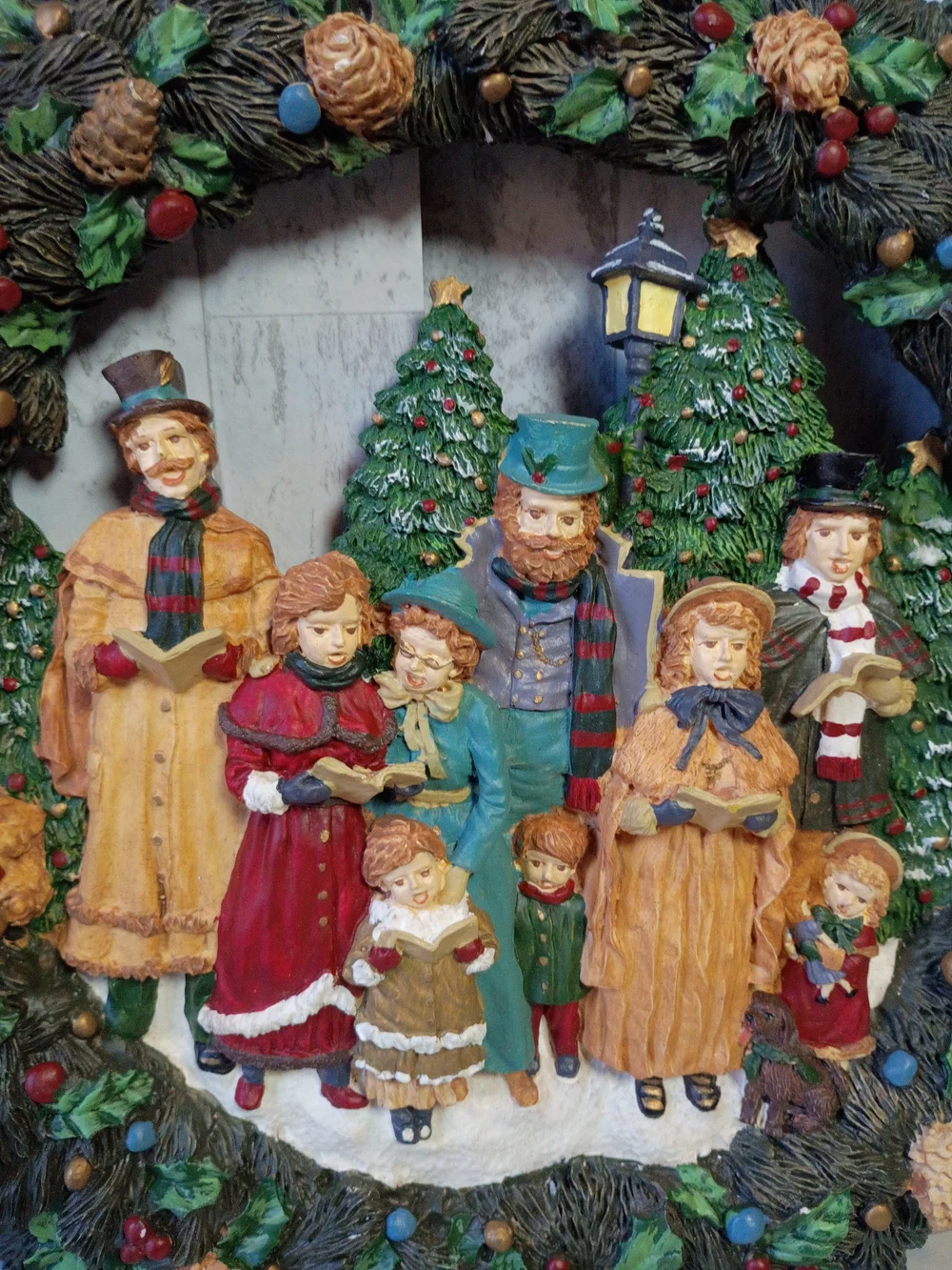 Resin wreath with vintage Christmas carols: traditional Christmas decoration